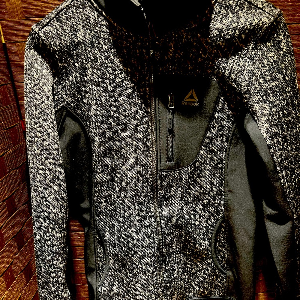 Adidas’s warm up sweater